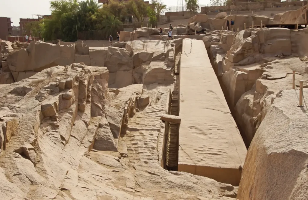 The Unfinished Obelisk lying in its trench in the granite quarry at Aswan, still attached to the bedrock