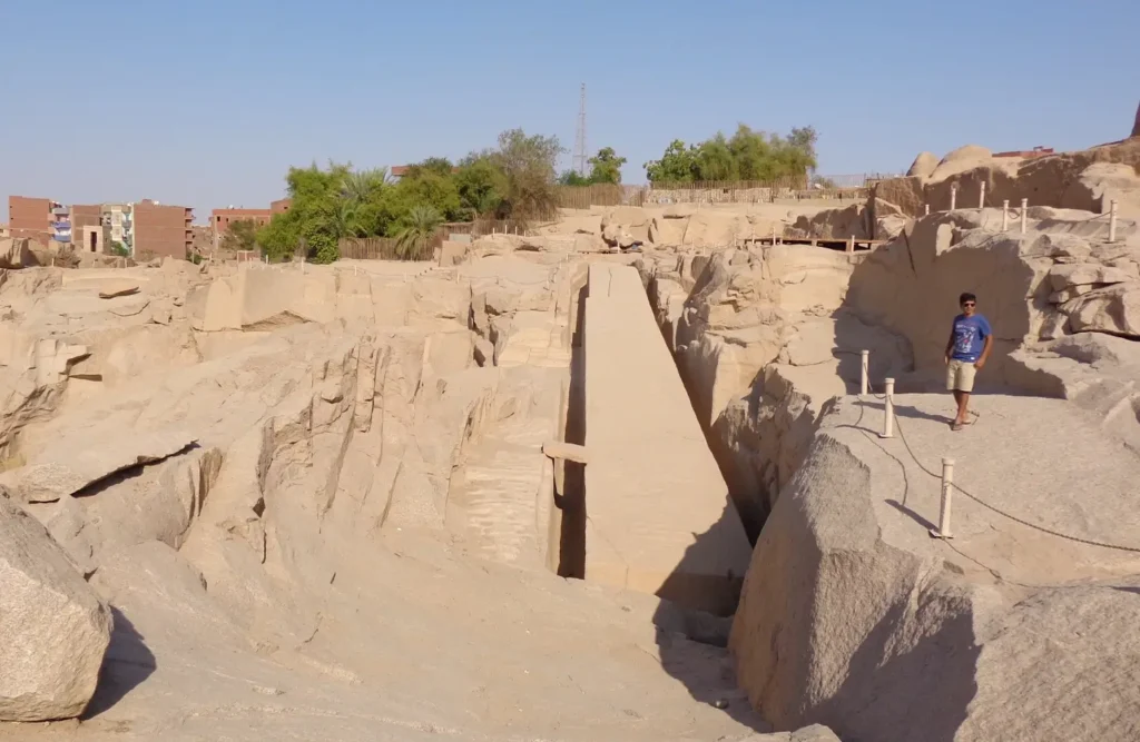 A visitor on the walkway above the Unfinished Obelisk in the Aswan granite quarry