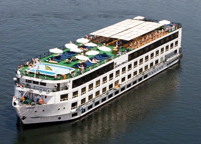 The Jaz Crown Prince Nile cruise ship seen from above on the Nile, its pool and sun deck laid out along the top